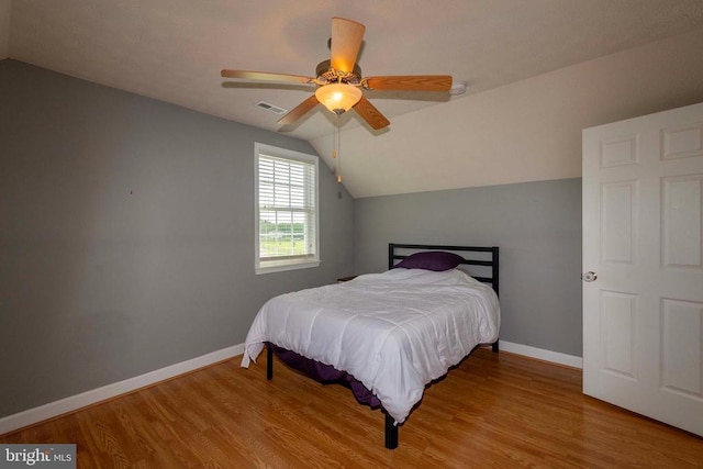 7204 Morris Rd, Spotsylvania, VA 22551 - bedroom featuring lofted ceiling, wood finished floors, baseboards, and ceiling fan