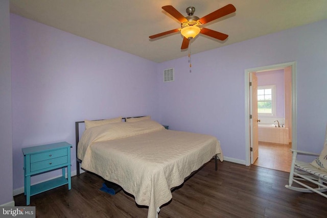 7204 Morris Rd, Spotsylvania, VA 22551 - bedroom with wood finished floors, baseboards, ceiling fan, and ensuite bath