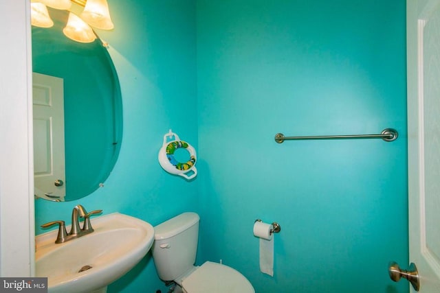 7204 Morris Rd, Spotsylvania, VA 22551 - half bath with a sink and toilet