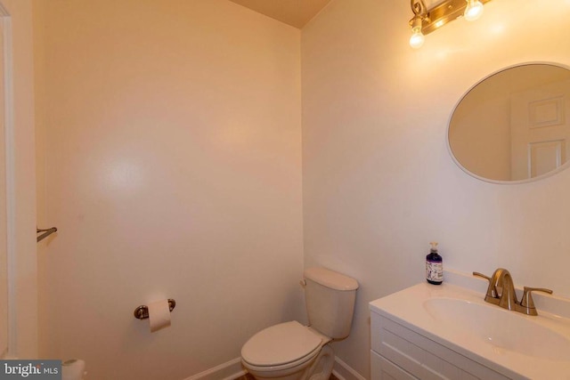 7204 Morris Rd, Spotsylvania, VA 22551 - half bath featuring toilet, vanity, and baseboards