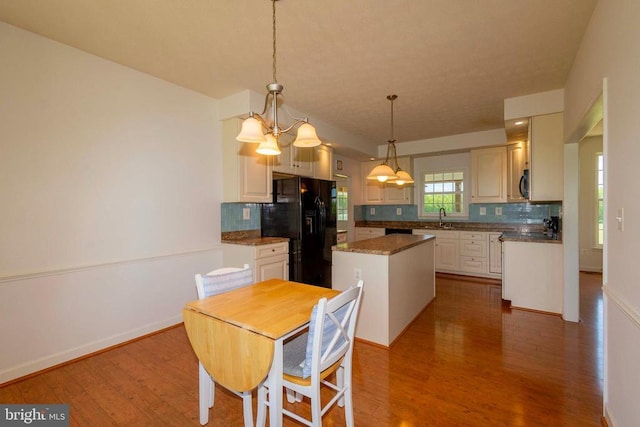 7204 Morris Rd, Spotsylvania, VA 22551 - dining area featuring dark wood finished floors and baseboards