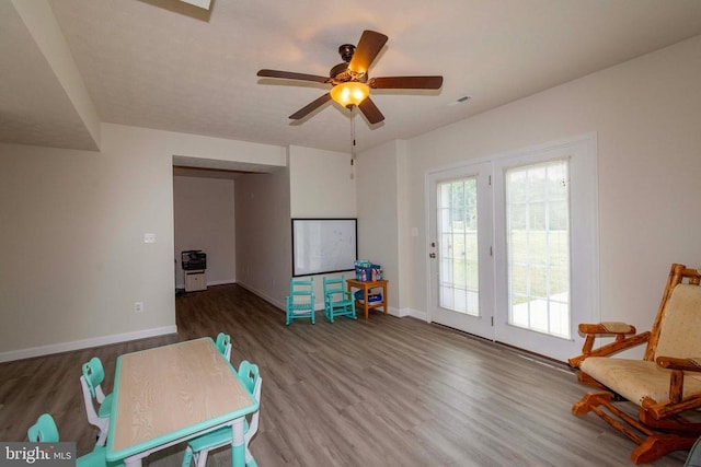 7204 Morris Rd, Spotsylvania, VA 22551 - rec room featuring wood finished floors, baseboards, and a ceiling fan