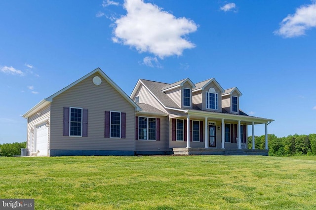 7204 Morris Rd, Spotsylvania, VA 22551 - view of front of home with a front yard, a porch, a garage, and central AC unit