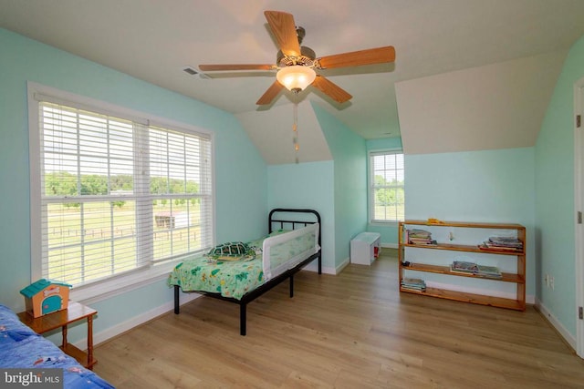 7204 Morris Rd, Spotsylvania, VA 22551 - bedroom featuring light wood finished floors, baseboards, lofted ceiling, and ceiling fan