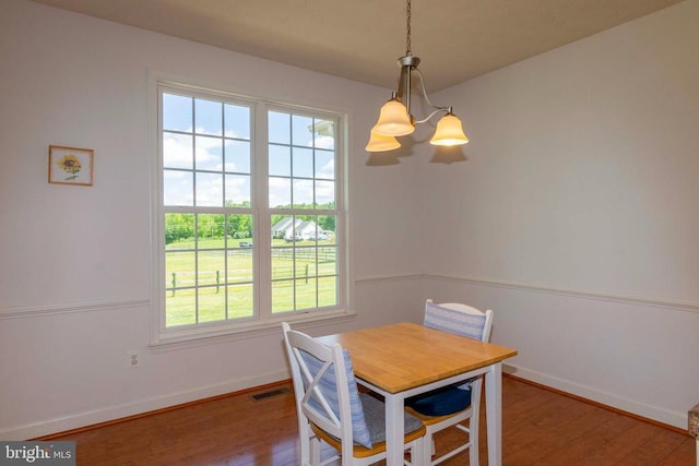 7204 Morris Rd, Spotsylvania, VA 22551 - dining room featuring a chandelier, baseboards, and plenty of natural light