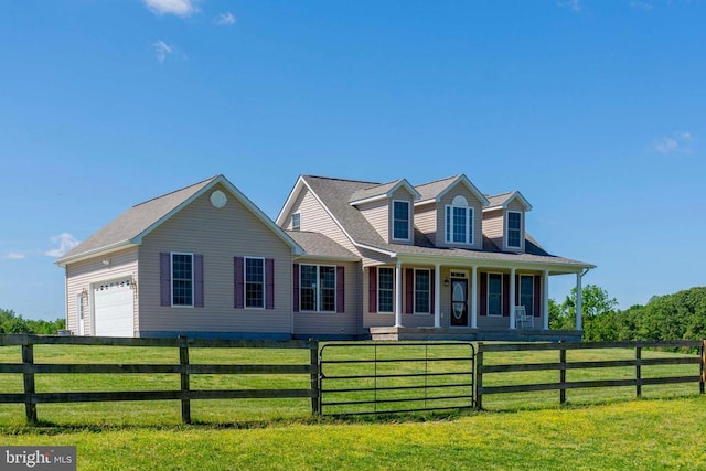 7204 Morris Rd, Spotsylvania, VA 22551 - new england style home with covered porch and an attached garage