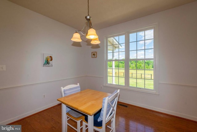 7204 Morris Rd, Spotsylvania, VA 22551 - dining area featuring healthy amount of natural light, baseboards, and hardwood / wood-style flooring
