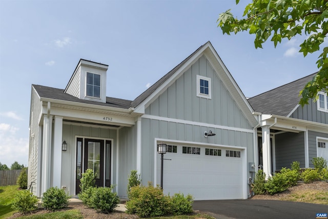 4752 Loyola Way, Charlottesville, VA 22902 - view of front of property featuring a garage, board and batten siding, and driveway