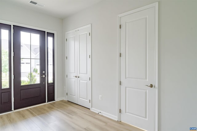 4752 Loyola Way, Charlottesville, VA 22902 - entrance foyer featuring healthy amount of natural light and light wood-style flooring