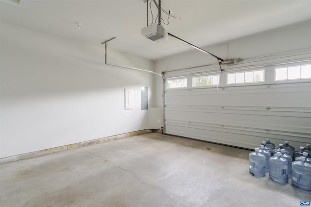 4752 Loyola Way, Charlottesville, VA 22902 - garage featuring a garage door opener and electric panel