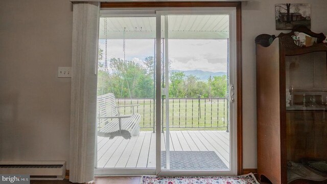 909 Mill Creek Rd, Luray, VA 22835 - entryway featuring a mountain view, plenty of natural light, and a baseboard heating unit