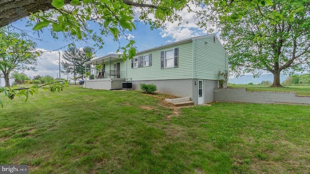 909 Mill Creek Rd, Luray, VA 22835 - back of property featuring central air condition unit and a lawn