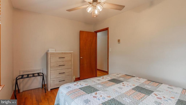909 Mill Creek Rd, Luray, VA 22835 - bedroom with wood finished floors and ceiling fan