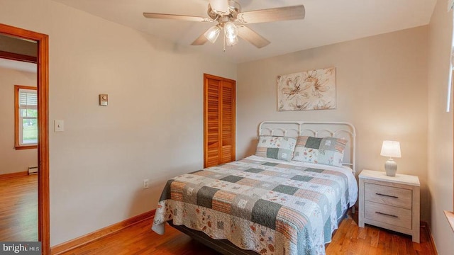 909 Mill Creek Rd, Luray, VA 22835 - bedroom with baseboards, a closet, and wood finished floors
