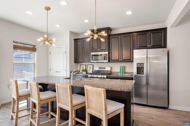 915 Flat Waters Ln, Charlottesville, VA 22911 - kitchen featuring appliances with stainless steel finishes, a chandelier, a sink, baseboards, and recessed lighting