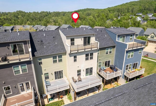915 Flat Waters Ln, Charlottesville, VA 22911 - rear view of house with a residential view, a wooded view, a balcony, and a shingled roof