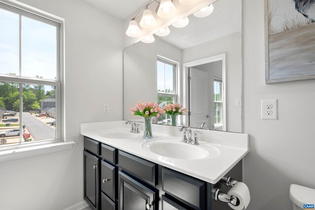 915 Flat Waters Ln, Charlottesville, VA 22911 - bathroom featuring toilet, double vanity, and baseboards