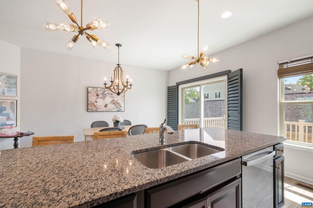 915 Flat Waters Ln, Charlottesville, VA 22911 - kitchen with a chandelier, a sink, stainless steel dishwasher, pendant lighting, and light wood-style floors