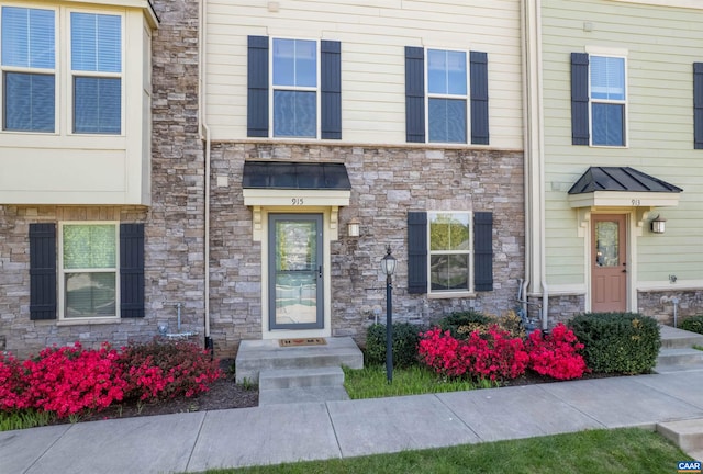 915 Flat Waters Ln, Charlottesville, VA 22911 - townhome / multi-family property featuring stone siding, a standing seam roof, and metal roof
