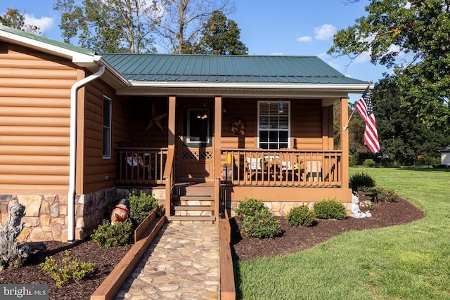 528 Ellis Dr, Luray, VA 22835 - view of front of home featuring a porch, a front lawn, and metal roof
