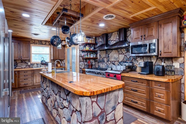 528 Ellis Dr, Luray, VA 22835 - kitchen with stainless steel microwave, wood ceiling, wall chimney range hood, a sink, and dark wood-type flooring