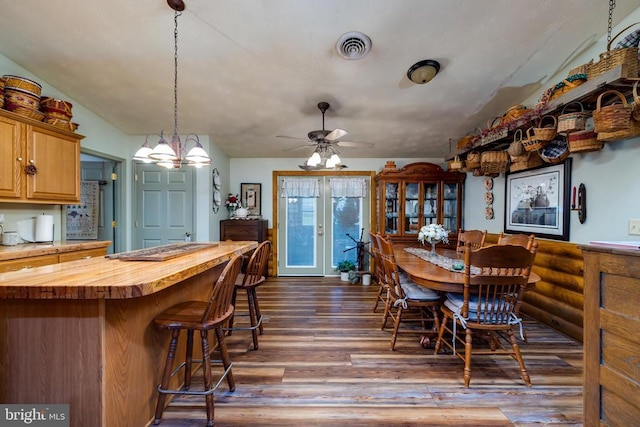 528 Ellis Dr, Luray, VA 22835 - dining room with dark wood finished floors, ceiling fan, and a chandelier