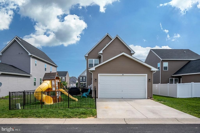 traditional home with a playground, concrete driveway, and a garage