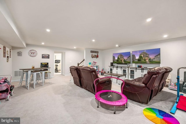 living area with recessed lighting, carpet flooring, and baseboards