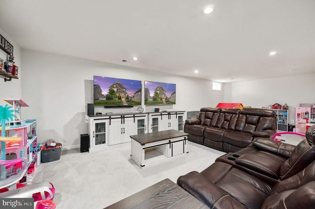 living room with recessed lighting and light colored carpet