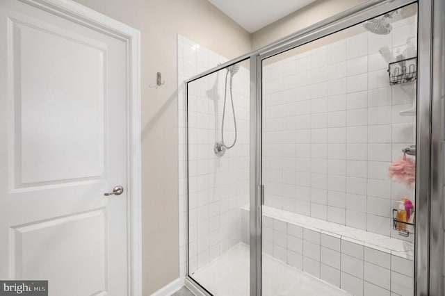 bathroom with a stall shower