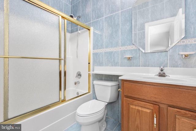 3714 Fairways Ct, Fredericksburg, VA 22408 - full bathroom with tile walls, vanity, enclosed tub / shower combo, and tile patterned flooring