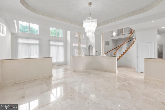 3714 Fairways Ct, Fredericksburg, VA 22408 - unfurnished dining area with a chandelier, a towering ceiling, stairs, and marble tiled flooring