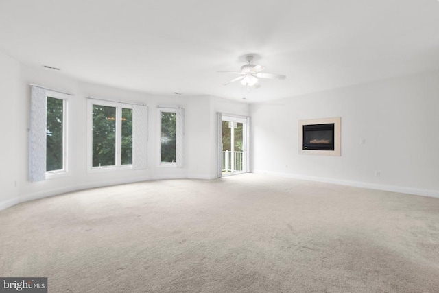 3714 Fairways Ct, Fredericksburg, VA 22408 - unfurnished living room with carpet floors, a glass covered fireplace, and ceiling fan