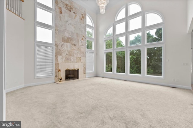 3714 Fairways Ct, Fredericksburg, VA 22408 - unfurnished living room with a towering ceiling, carpet floors, and a fireplace