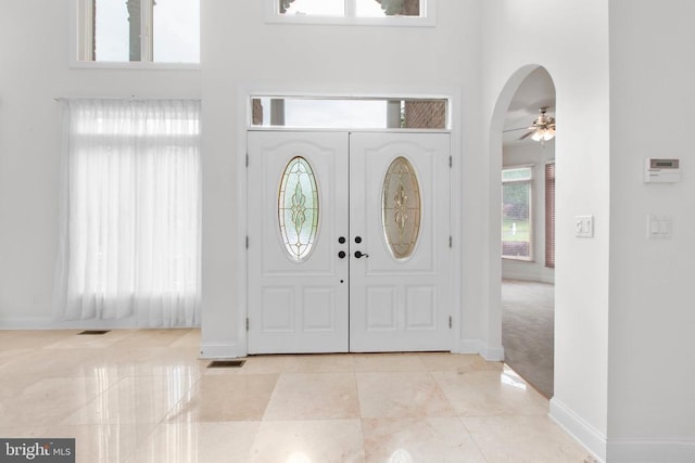 3714 Fairways Ct, Fredericksburg, VA 22408 - entrance foyer featuring ceiling fan, a towering ceiling, and arched walkways