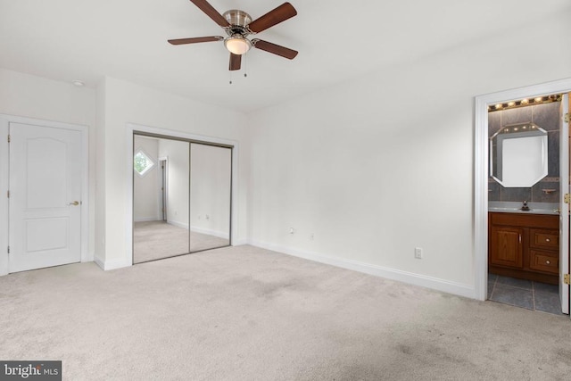 3714 Fairways Ct, Fredericksburg, VA 22408 - unfurnished bedroom featuring carpet flooring, a closet, connected bathroom, and a ceiling fan