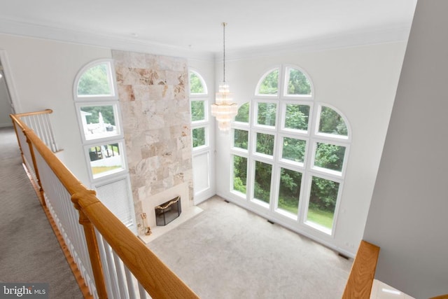 3714 Fairways Ct, Fredericksburg, VA 22408 - unfurnished living room featuring carpet, healthy amount of natural light, ornamental molding, and a fireplace