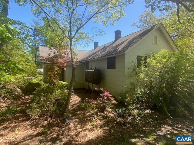 5367 James Madison Hwy, Fork Union, VA 23055 - view of side of property with oil tank and a chimney