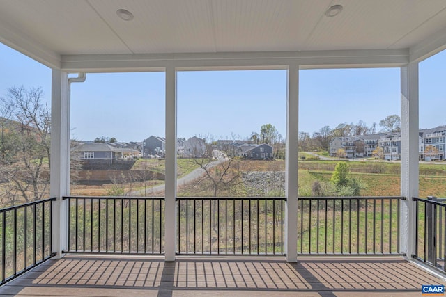 36 Mary Jackson Ct, Charlottesville, VA 22902 - unfurnished sunroom featuring a residential view and plenty of natural light