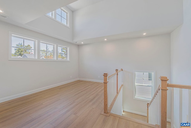 36 Mary Jackson Ct, Charlottesville, VA 22902 - spare room with plenty of natural light, light wood-style flooring, baseboards, a high ceiling, and recessed lighting