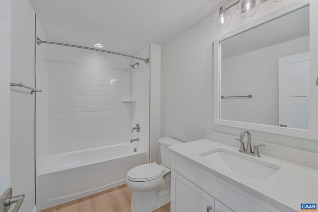 36 Mary Jackson Ct, Charlottesville, VA 22902 - bathroom featuring wood finished floors, toilet, vanity, and washtub / shower combination