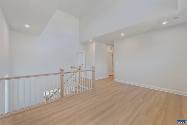 36 Mary Jackson Ct, Charlottesville, VA 22902 - empty room featuring light wood-type flooring, a high ceiling, recessed lighting, and baseboards