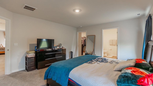 306 Coyote Run, Broadway, VA 22815 - bedroom featuring light colored carpet, baseboards, ensuite bath, and a spacious closet