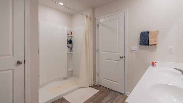 306 Coyote Run, Broadway, VA 22815 - bathroom with a sink, wood finished floors, and a shower stall