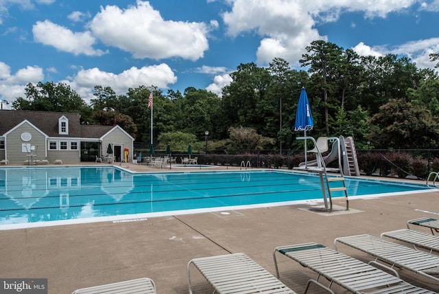 3910 Corbin Hall Ln, Fredericksburg, VA 22408 - community pool featuring a patio area and view of scattered trees