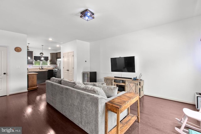 2422 Drake Ln, Fredericksburg, VA 22408 - living area featuring dark wood-style flooring, baseboards, and recessed lighting