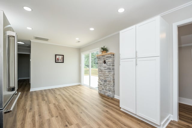 274 Dry Branch Rd, Churchville, VA 24421 - unfurnished living room featuring crown molding, baseboards, light wood-style floors, and recessed lighting