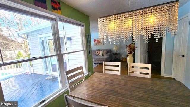 6603 Farmstead Ln, Fredericksburg, VA 22407 - sunroom featuring a chandelier and healthy amount of natural light