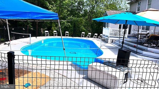 6603 Farmstead Ln, Fredericksburg, VA 22407 - community pool featuring a patio area and view of scattered trees