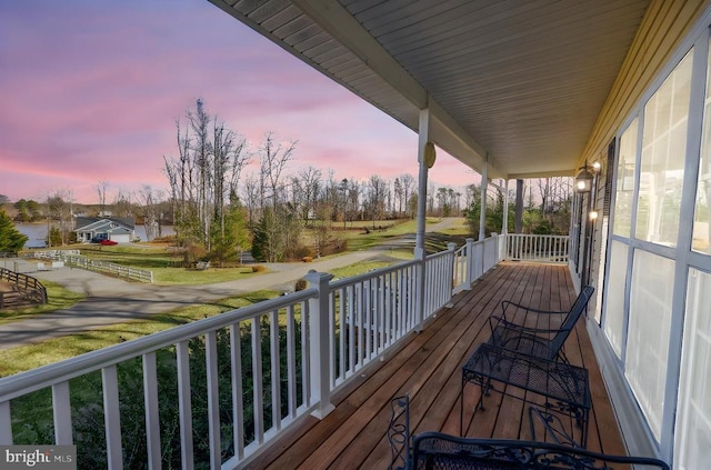 deck featuring covered porch